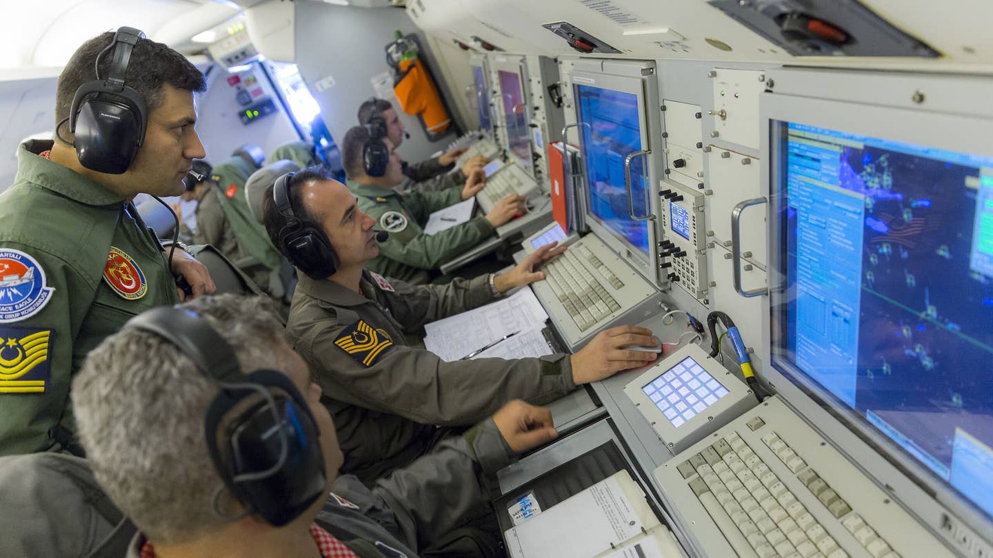 Turkish Air Force E-7 Wedgetail airborne early warning and control jet mission specialists observing data from the sensors. (Photo by Orhan Akkanat/Anadolu Agency/Getty Images)