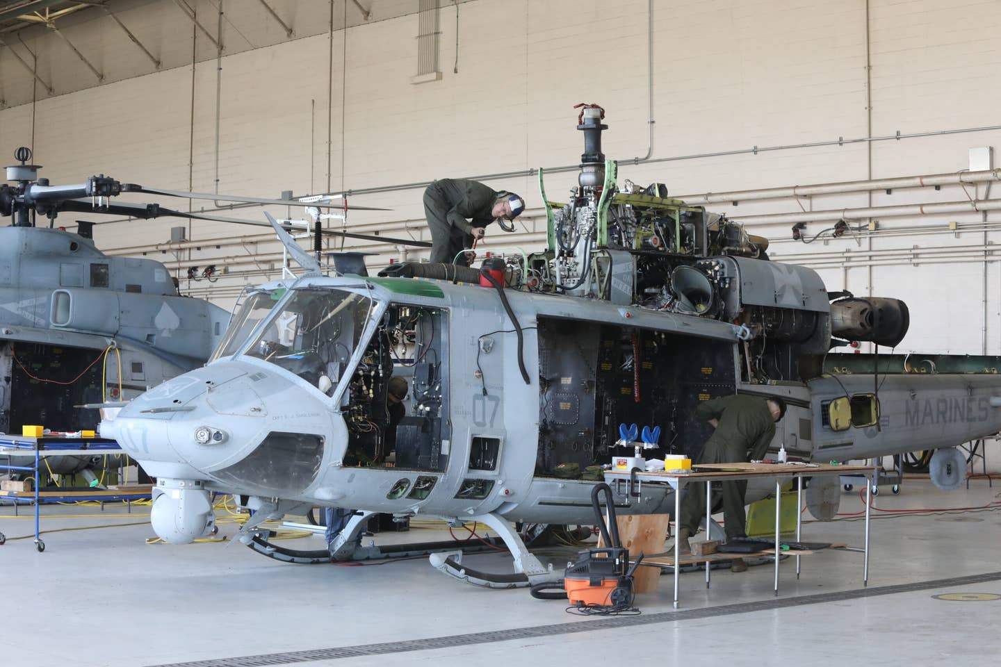 The AH-1 and UH-1 are both born from the same Huey and share the majority of their components, making logistics and forward support far less complex. (Author)