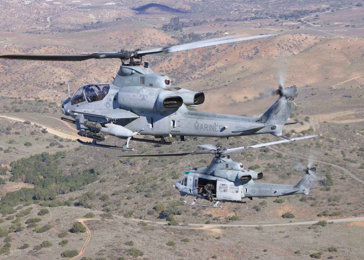 AH-1Z and UH-1Y side-by-side on a training mission. (Author)