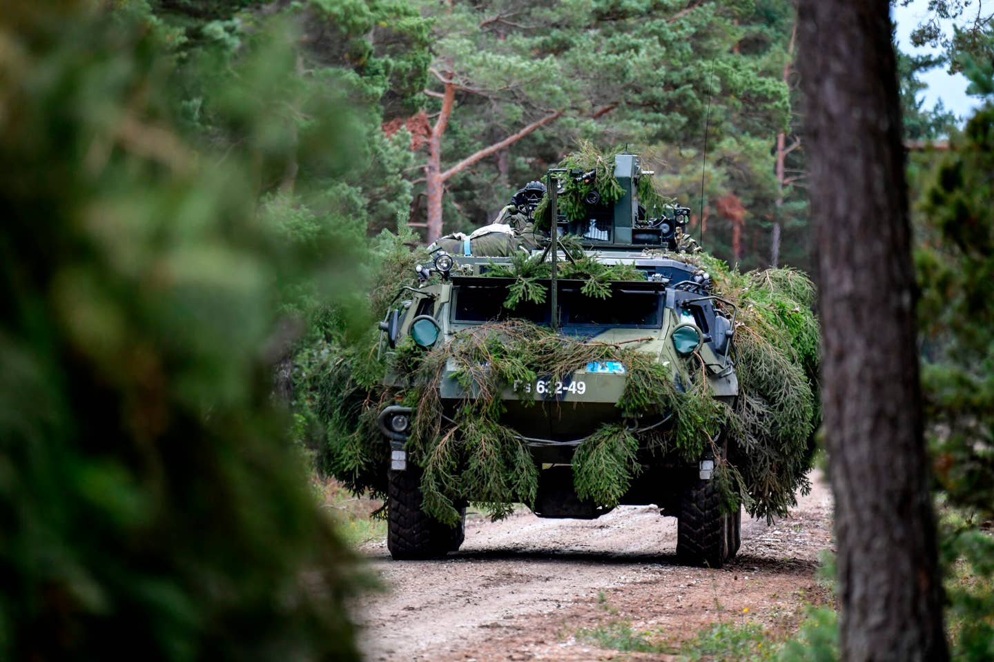 A Finnish armored personnel carrier during the Aurora 17 joint exercise between Finnish and Swedish troops on the Swedish island of Gotland. <em>ANDERS WIKLUND/AFP via Getty Images</em>