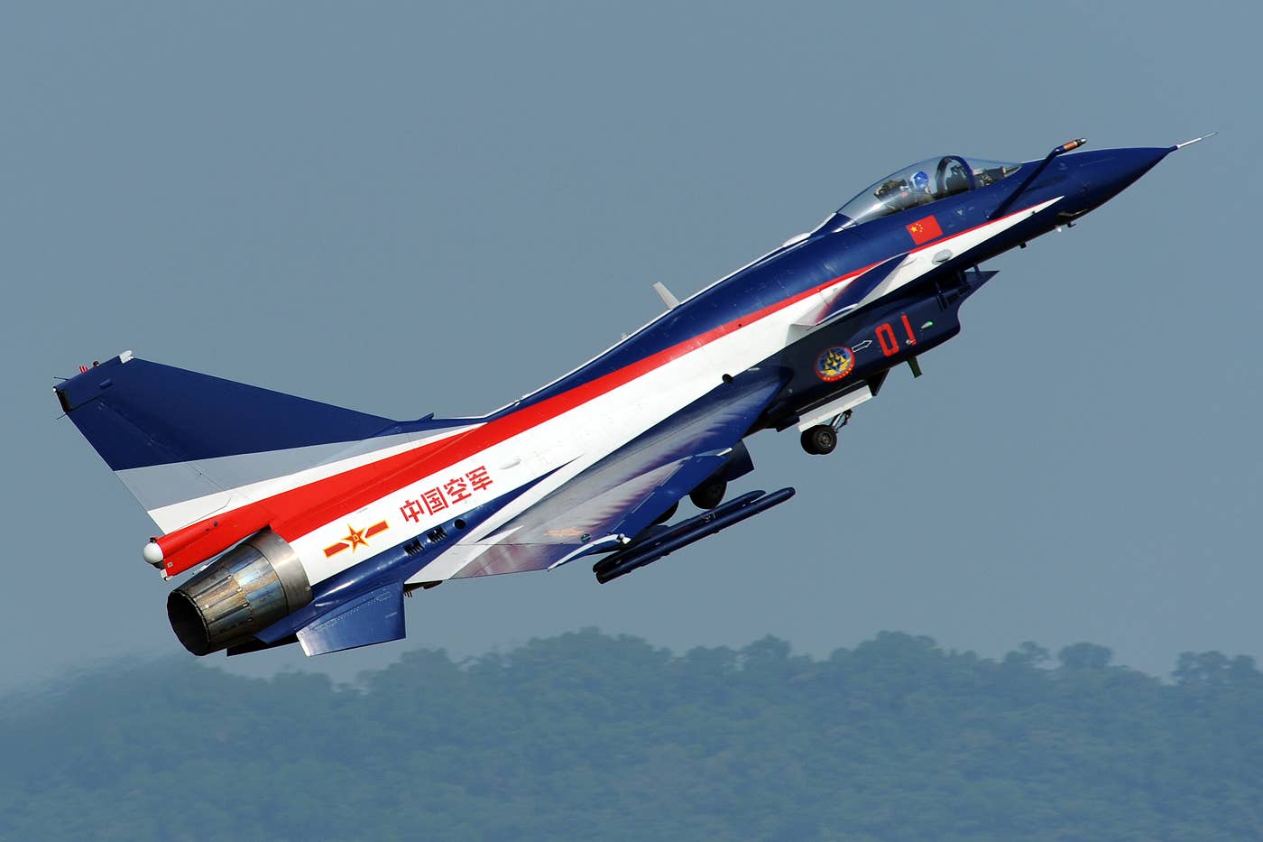 PLAAF J-10AY of the August 1st "Ba Yi" aerobatics team. <em>Peng Chen via Wikimedia Commons</em>