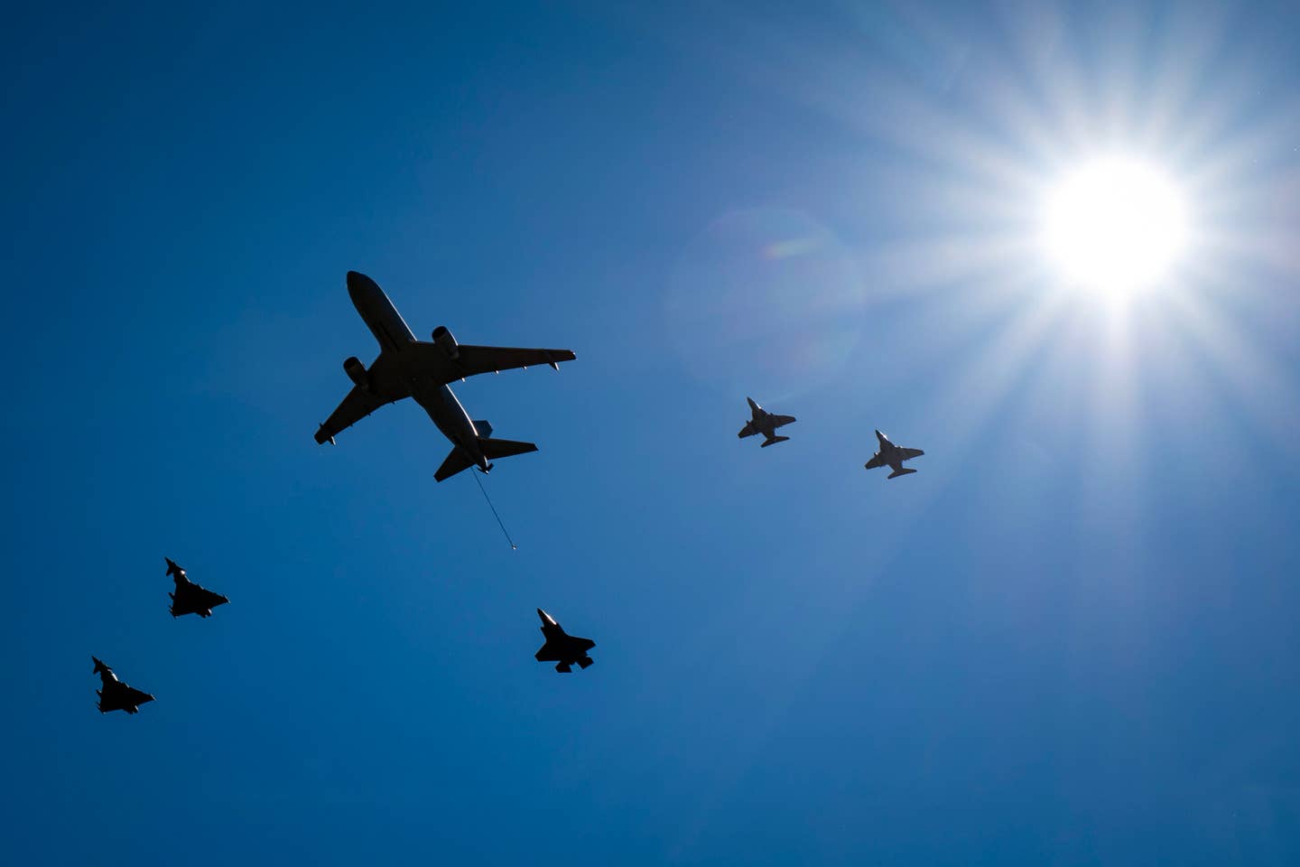 A KC-767 tanker followed by a single F-35 and flanked by pairs of Typhoons and T-346s. <em>Daniele Faccioli </em>