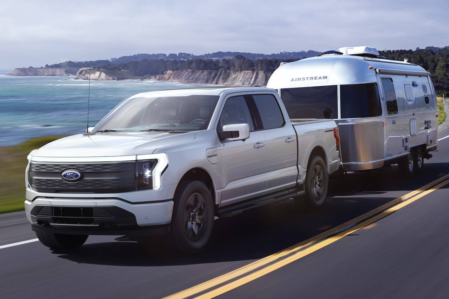 2022 Ford F-150 Lightning Lariat towing an Airstream trailer. <em>Ford</em>
