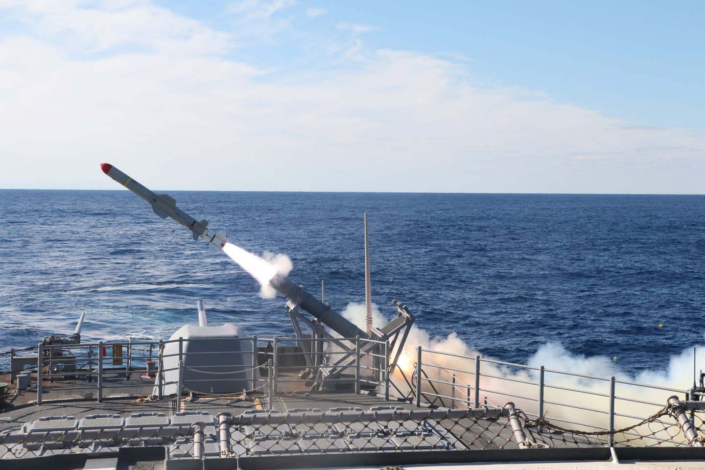 The <em>Ticonderoga</em> class guided-missile cruiser USS <em>Monterey</em> launches a harpoon surface-to-surface missile during a Surface Warfare Advanced Tactical Training exercise. <em>Credit: U.S. Navy photo by Fire Controlman Third Class Raymond Castillo</em>