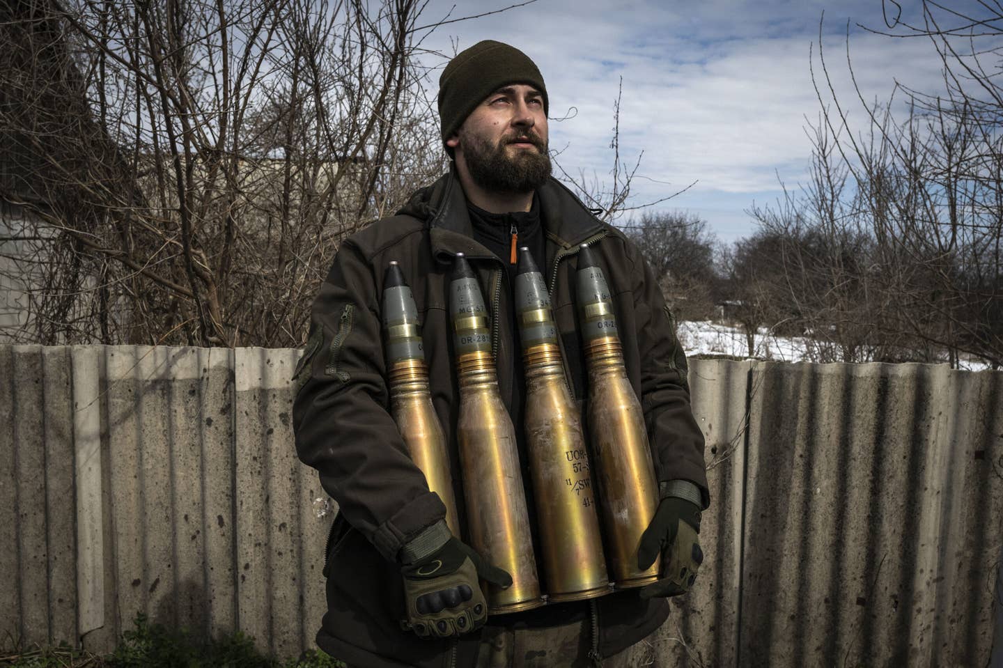 A Ukrainian soldier holds artillery ammunition near the frontline area in Bakhmut on April 02, 2023. (Photo by Muhammed Enes Yildirim/Anadolu Agency via Getty Images)