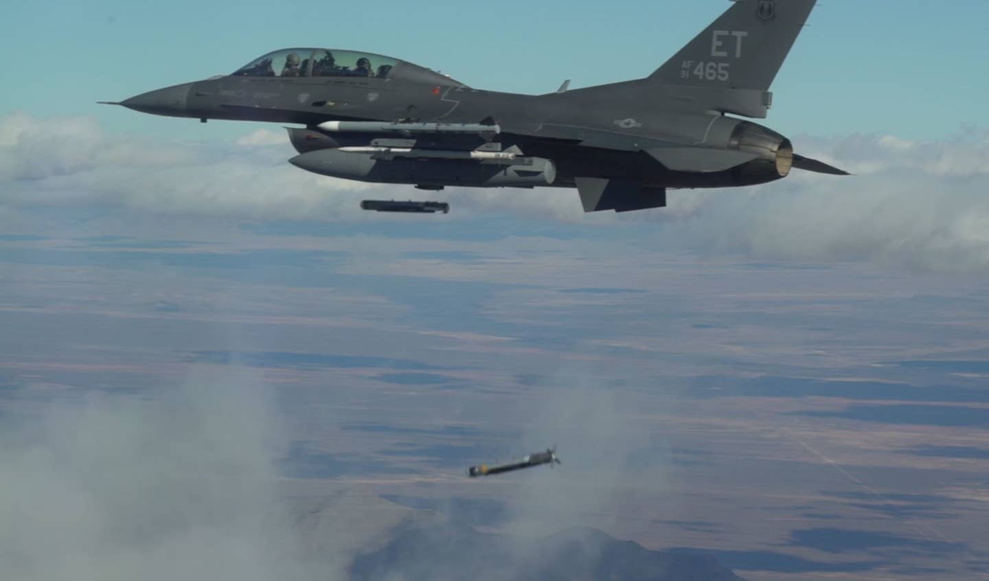 Collaborative Small Diameter Bombs are launched from the wing of an F-16 fighter from the Air Force Test Center’s 96th Test Wing at Eglin AFB. <em>Credit: U.S. Air Force</em>