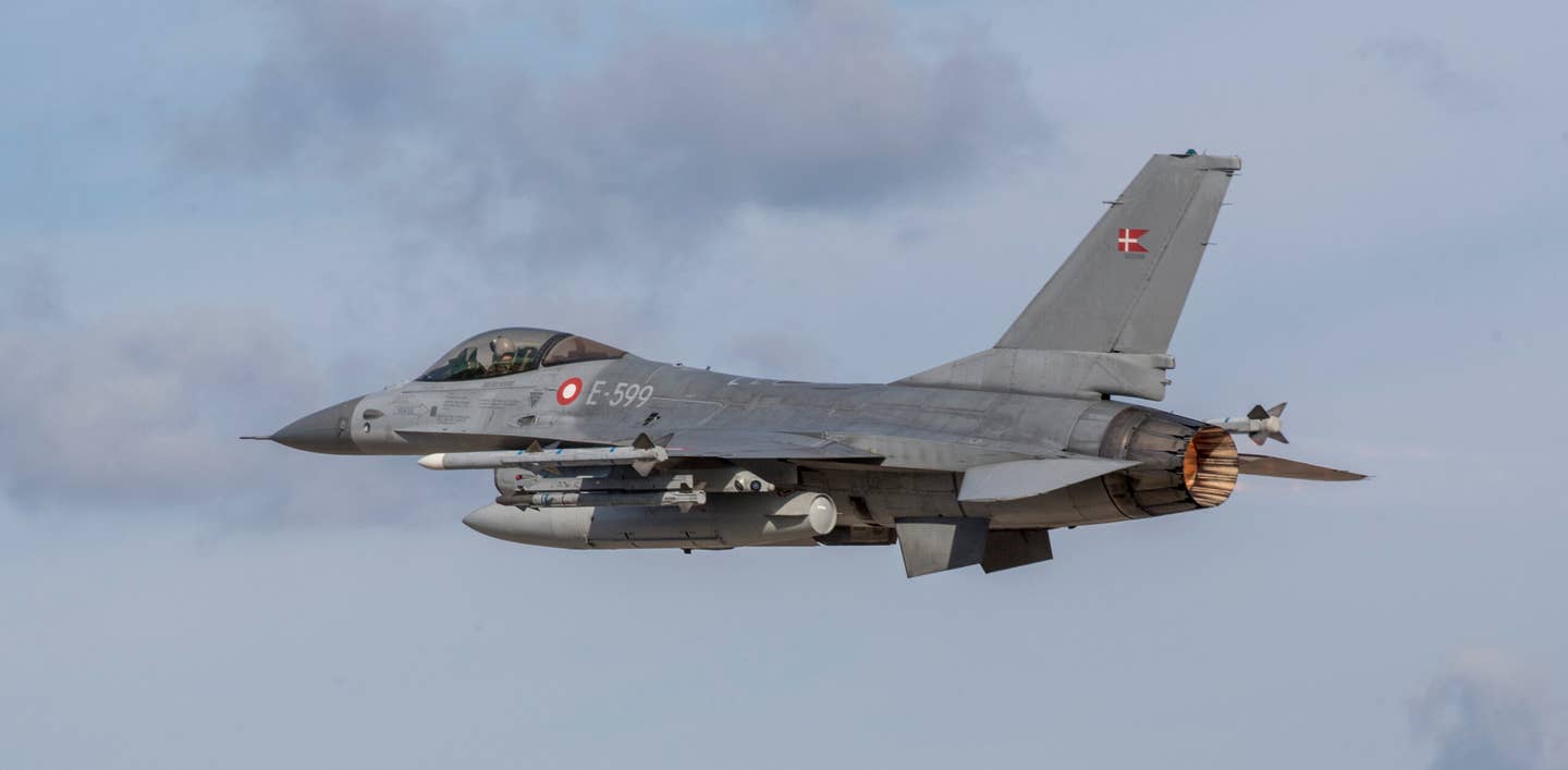 A Royal Danish Air Force F-16AM takes off from Monte Real Air Force Base in Portugal during the Real Thaw 2018 exercise. <em>Photo by Horacio Villalobos - Corbis/Corbis via Getty Images</em>