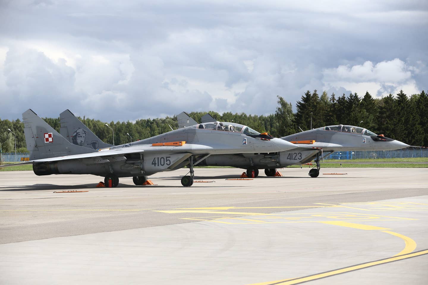 A pair of Polish Air Force two-seat MiG-29UBs at Malbork Air Base, Poland in August 2021. <em>Photo by Cuneyt Karadag/Anadolu Agency via Getty Images</em>