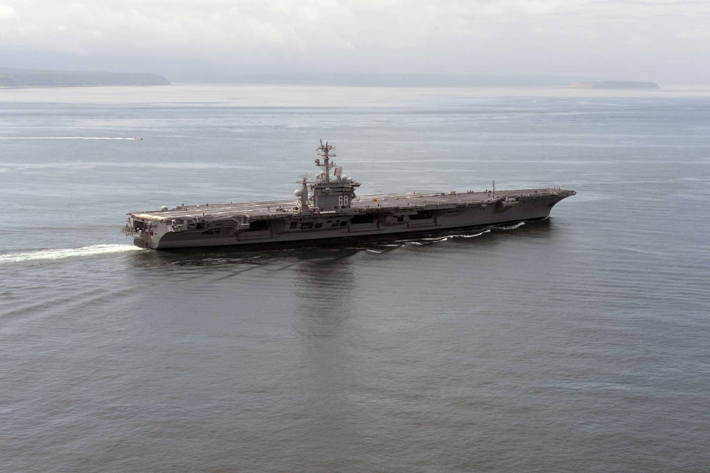 USS <em>Nimitz</em> transits the Strait of Juan de Fuca in Washington June 13, 2014. <em>Credit: U.S. Navy photo by Mass Communication Specialist 2nd Class John Hetherington</em>