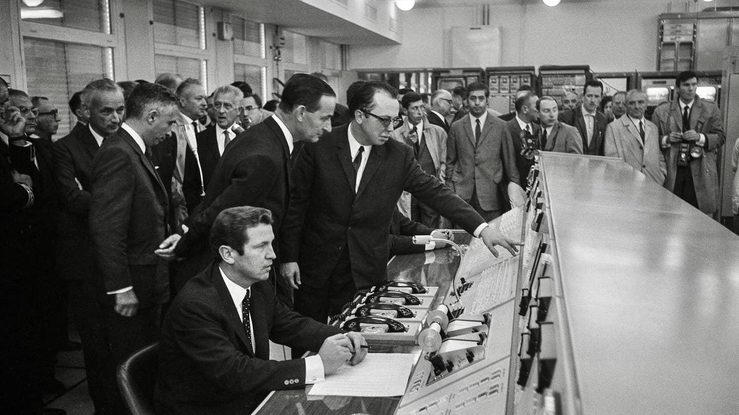 France's then-minister of Posts, Telegraphs, and Telephones, Robert Galley, in the control room of the Space Telecommunications Center at Pleumeur-Bodou in September 1969