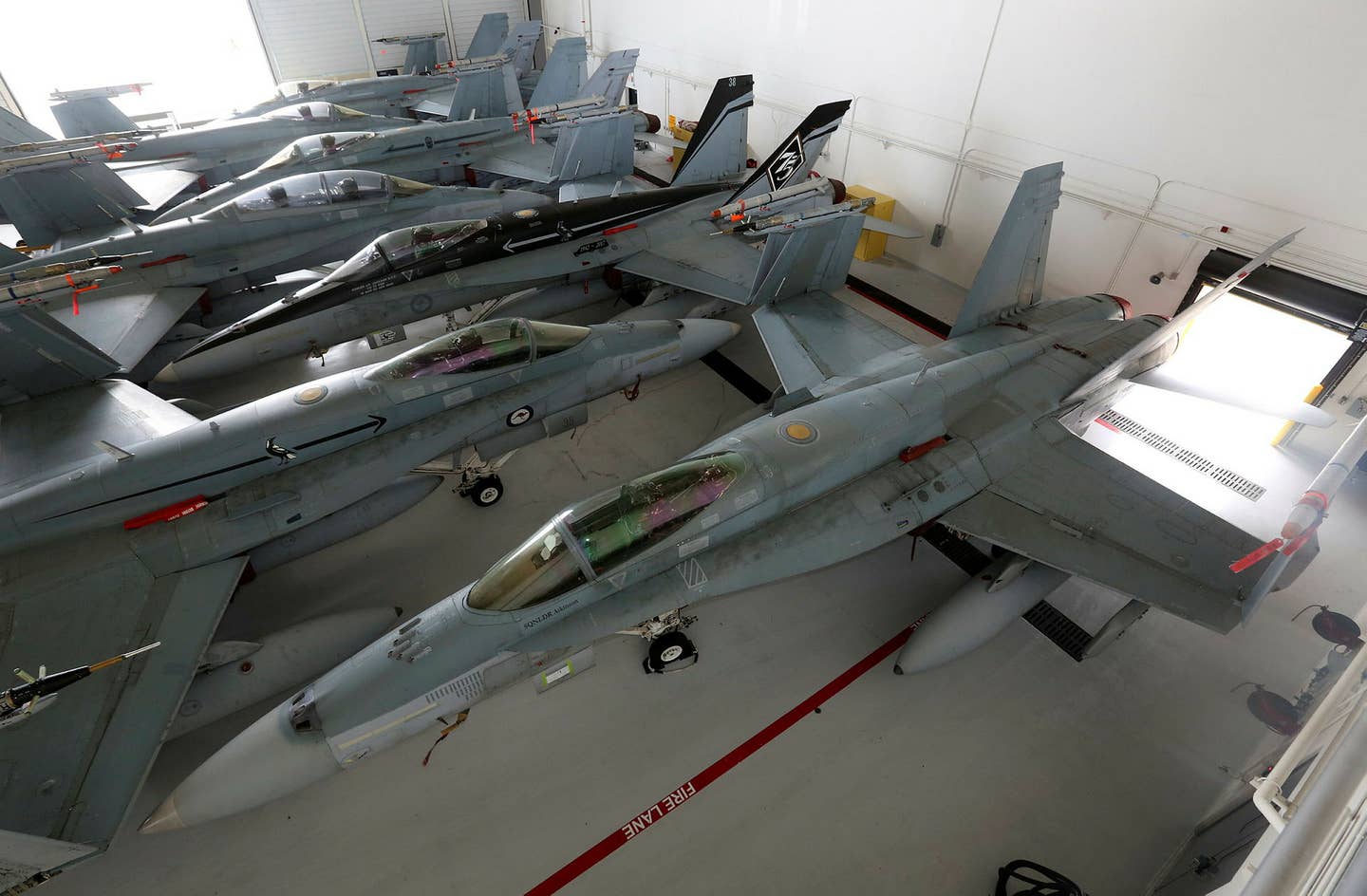 RAAF F/A-18s packed into a hangar at Andersen AFB in Guam. (RAAF)