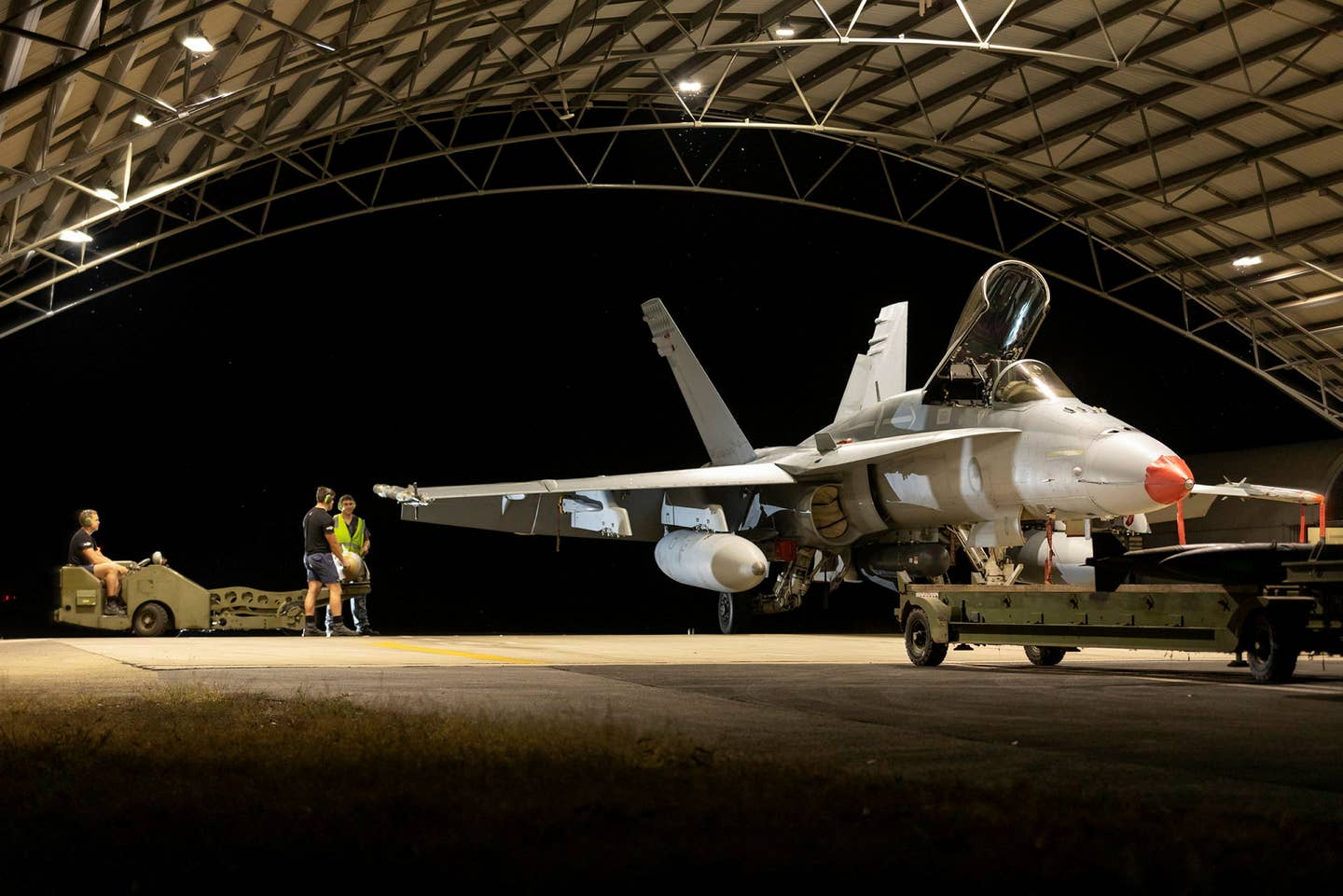 RAAF F/A-18A receives weapons prior to a sortie. (RAAF)
