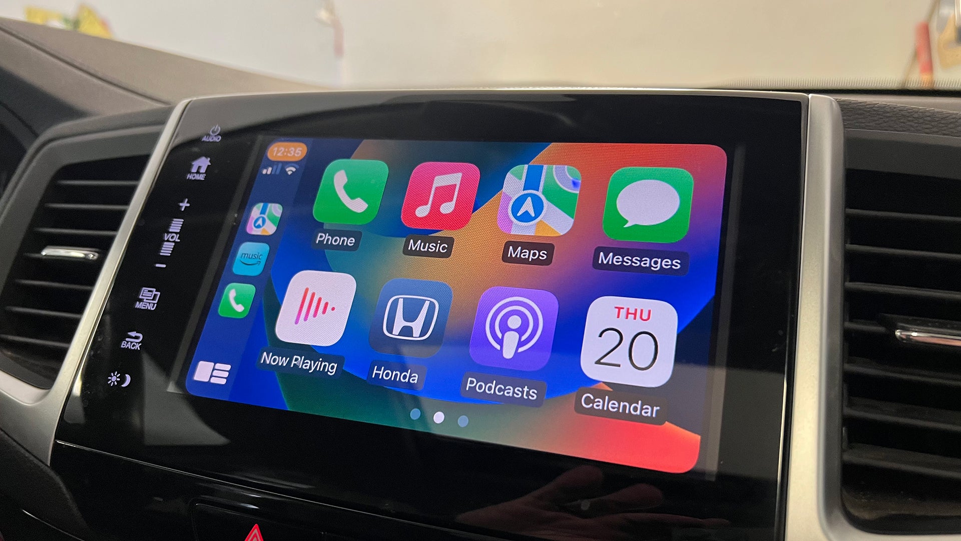 How does Apple CarPlay work and what are its advantages?