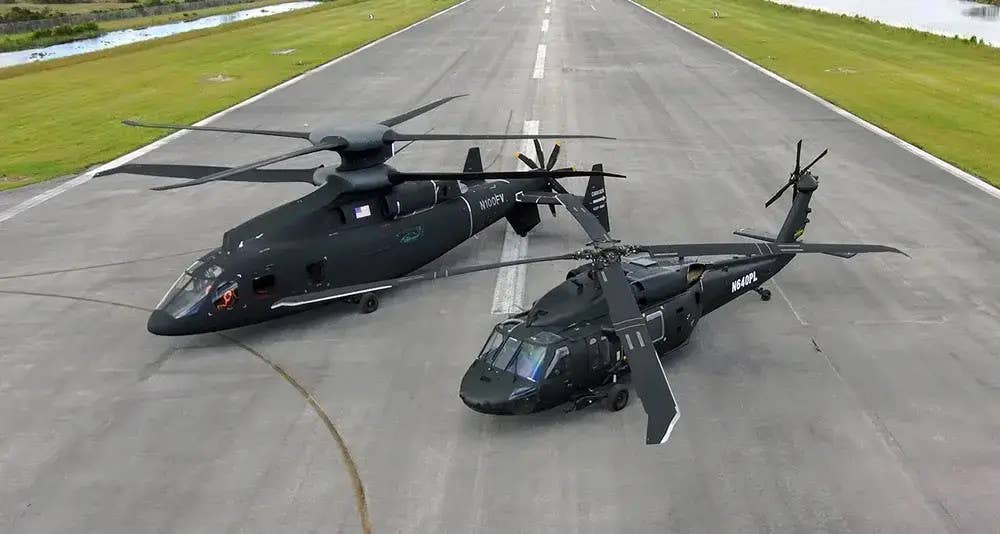 The Sikorsky/Boeing SB&gt;1 Defiant, at left, next to a UH-60 Black Hawk. <em>Lockheed Martin/Sikorsky</em>