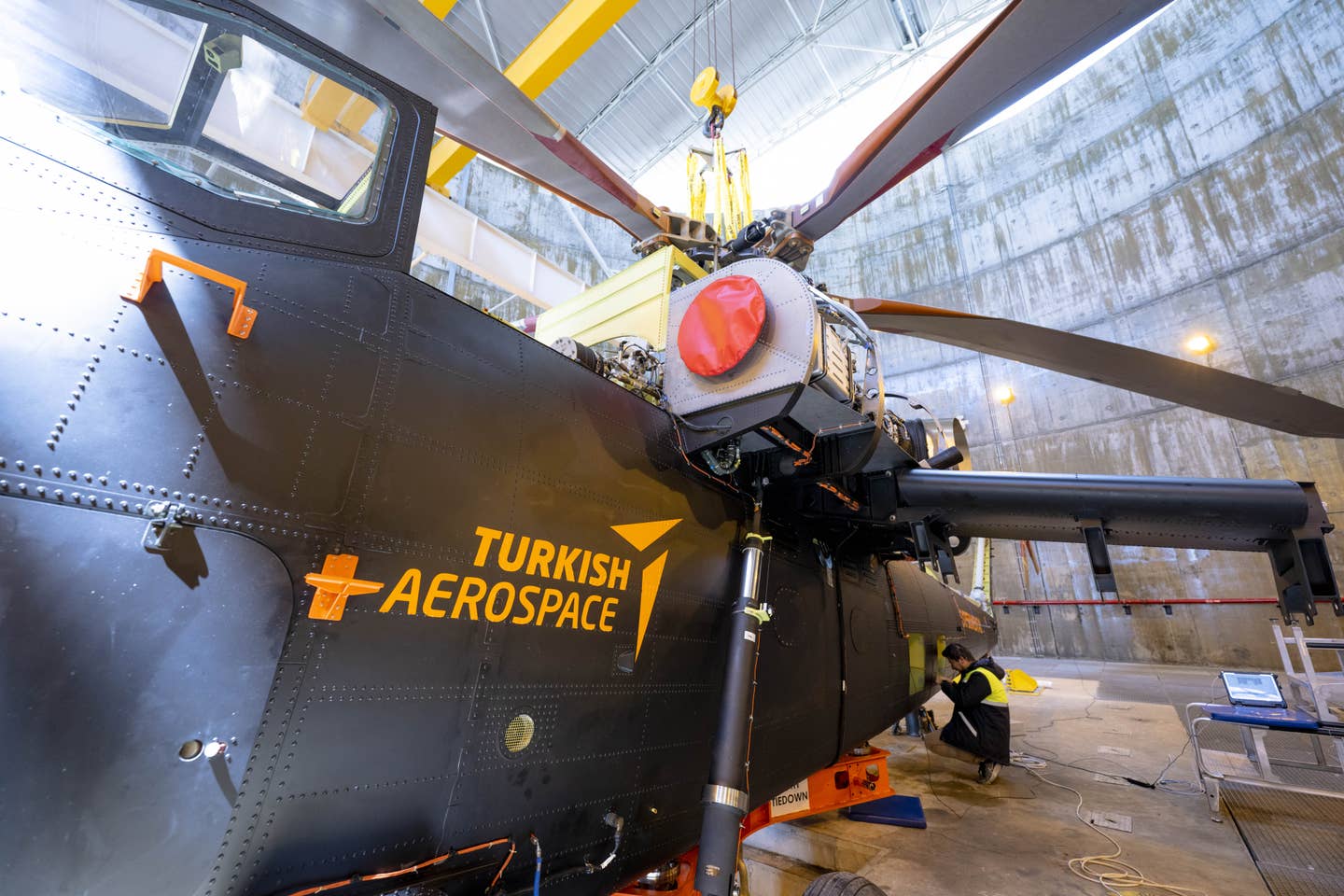 Engineers work on the T929 in the engine test facility in Ankara. <em>Photo by Aytac Unal/Anadolu Agency via Getty Images</em>