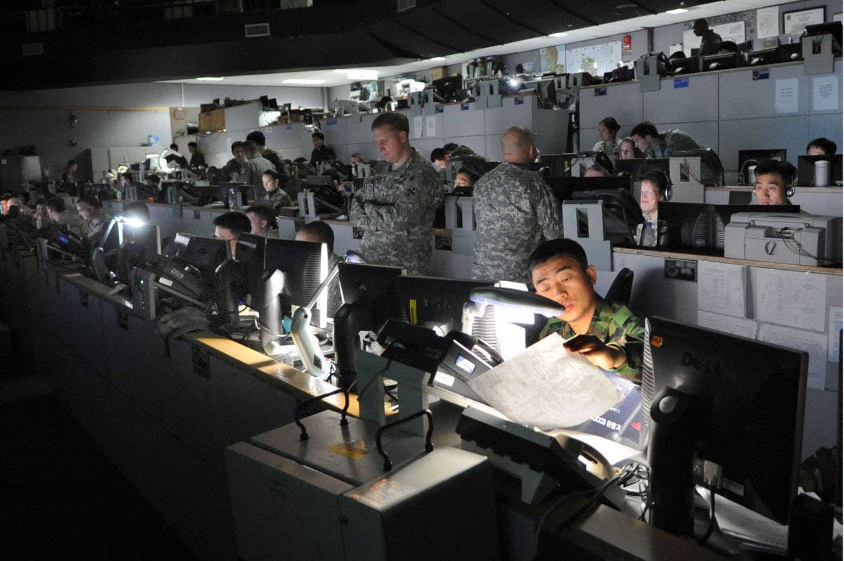 U.S. and South Korean personnel together at the Korea Air Operations Center at Osan Air Base, South Korea, during an exercise in 2010. <em>USAF</em>