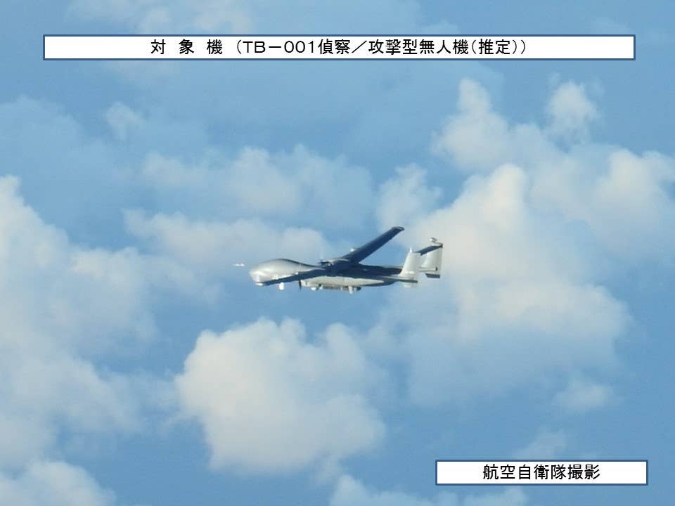 A TB-001 over the East China Sea in August 2021, in an official photo released by the Japan Ministry of Defense.  <em>Japan Ministry of Defense</em>