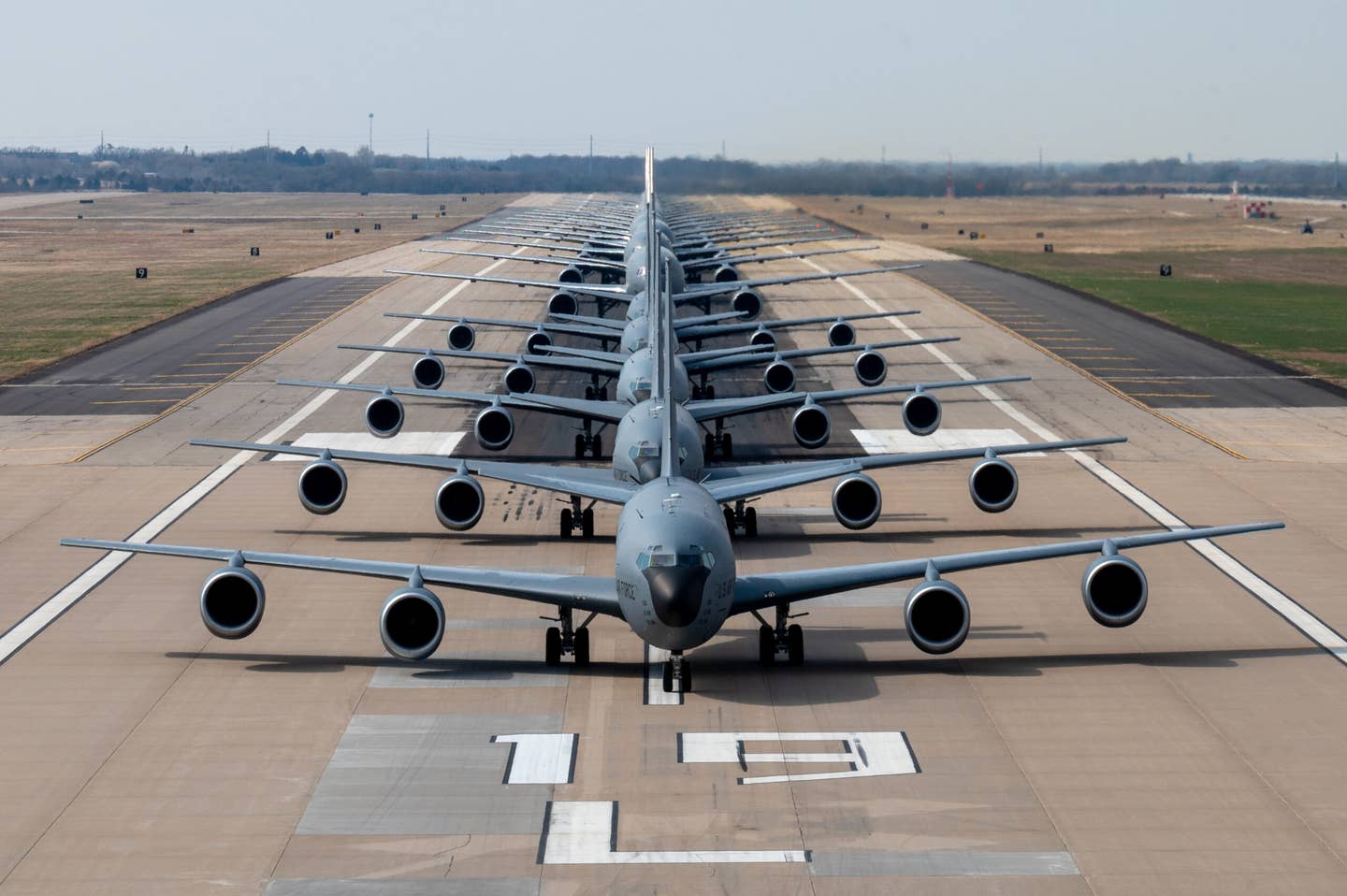 16 KC-46s and five KC-135s line up for the elephant walk during Exercise Lethal Pride on March 27, at McConnell Air Force Base, Kansas. <em>U.S. Air Force photo by Airman 1st Class Brenden Beezley</em><br>