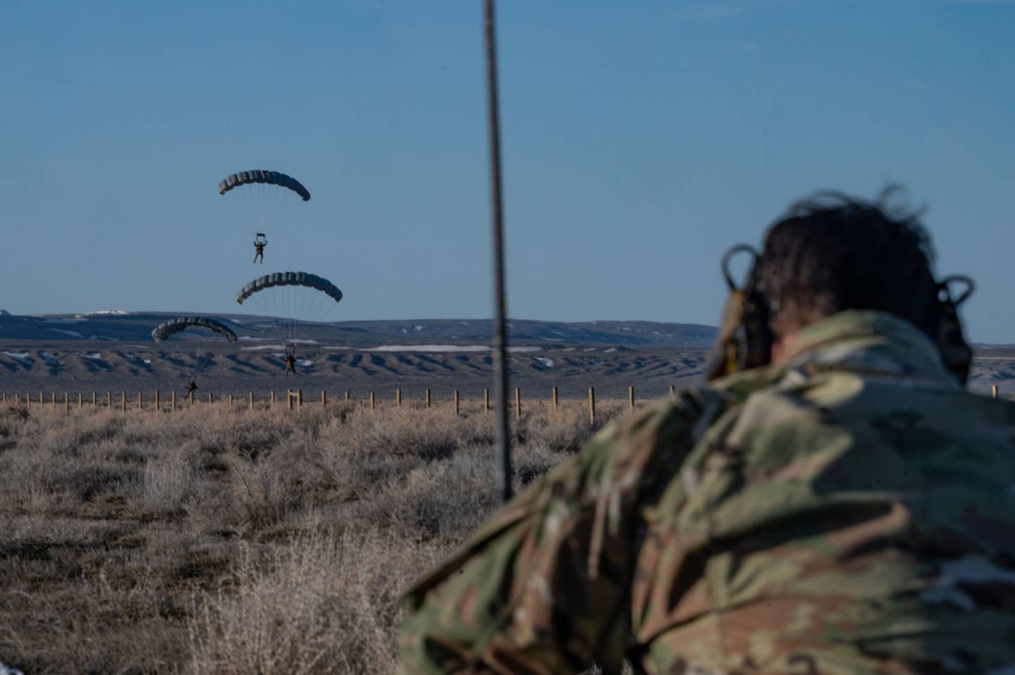 123rd Special Tactics Squadron operators land after performing a static line jump from an MC-130J Commando II during Exercise Agile Chariot, April 30, 2023. <em>U.S. Air Force photo by Tech. Sgt. Carly Kavish</em>