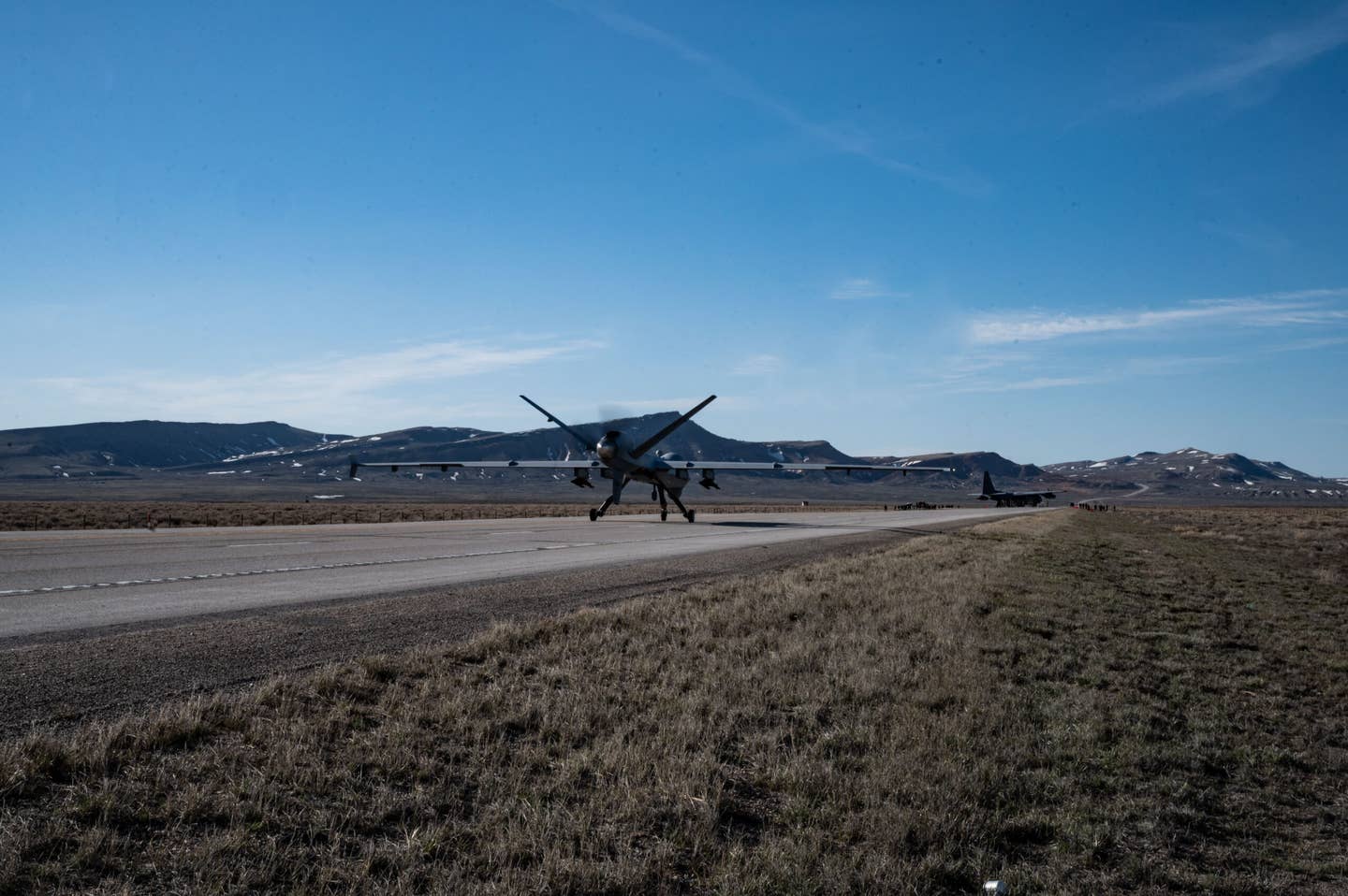 An MQ-9 Reaper lands on Highway 287 during Exercise Agile Chariot. <em>U.S. Air Force photo by Tech. Sgt. Carly Kavish</em>