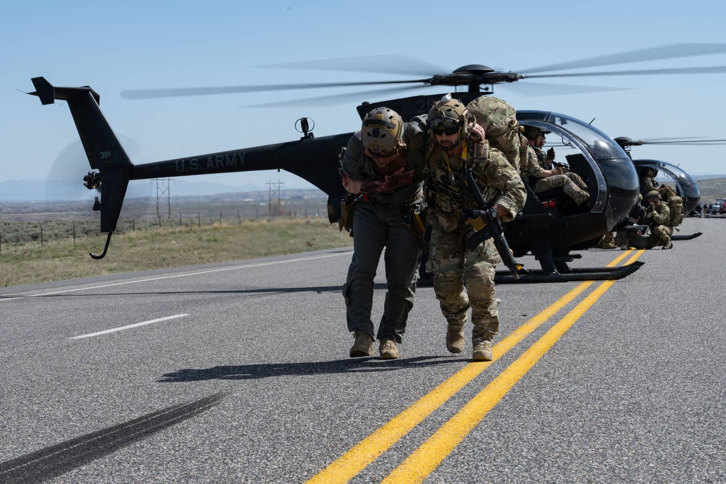 Members of the U.S. Army’s 160th Special Operation Aviation Regiment and U.S. Air Force’s 123rd Special Tactics Squadron participate in a search and rescue scenario as part of Exercise Agile Chariot, near Riverton, Wyoming, May 2, 2023. <em>U.S. Air Force photo by Senior Airman Natalie Fiorilli</em><br>