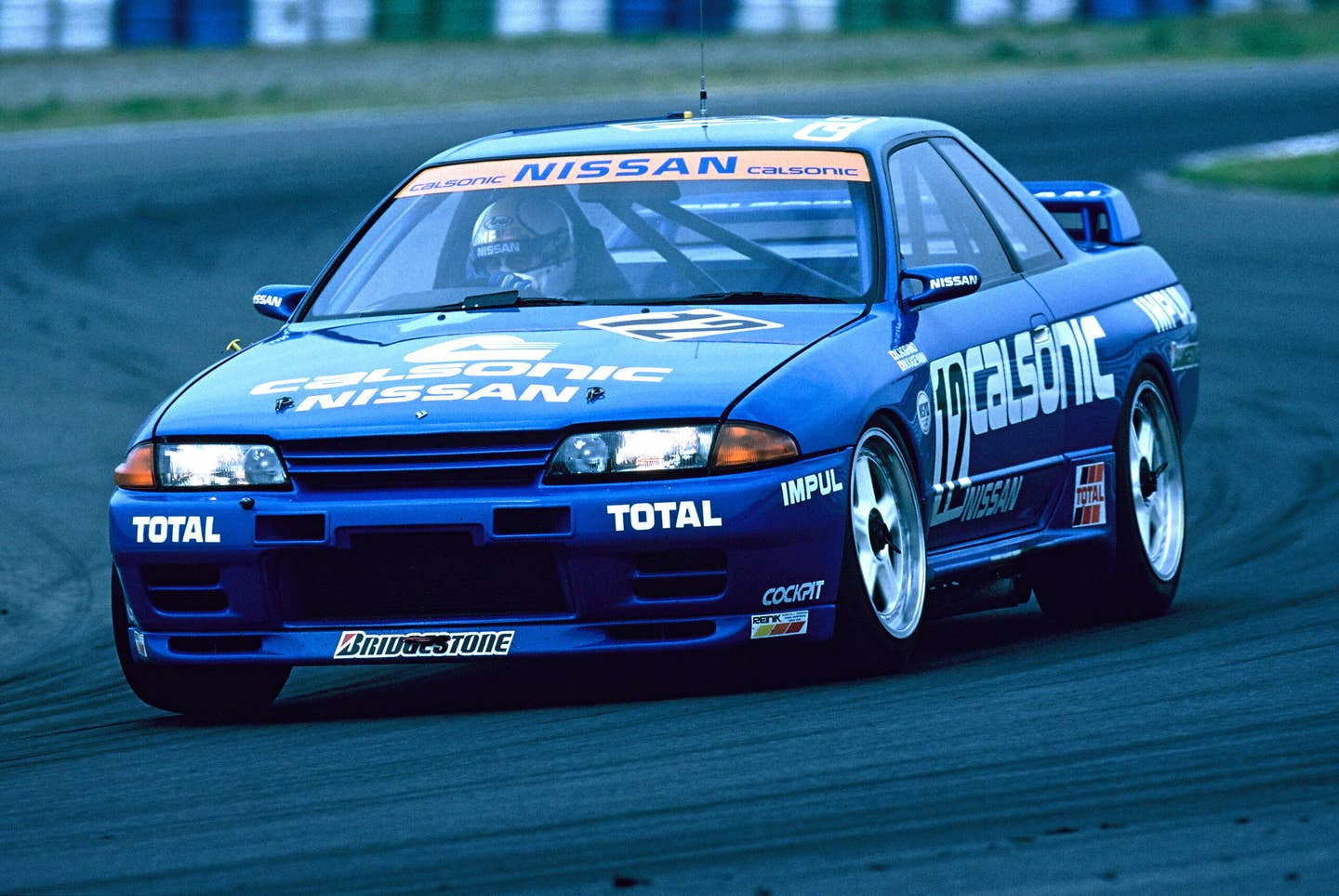 Calsonic Nissan GT-R racing in period.