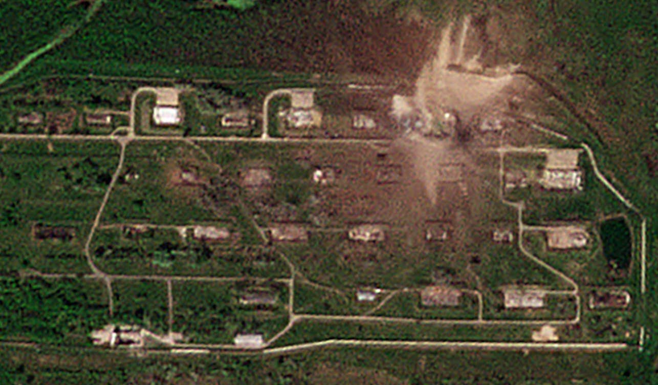 A crop of the new image of the storage site from Planet Labs focusing on the most affected areas, showing major structure damage, as well as places where trees and other flora have been blown away. <em>PHOTO © 2023 PLANET LABS INC. ALL RIGHTS RESERVED. REPRINTED BY PERMISSION / Google Earth</em>