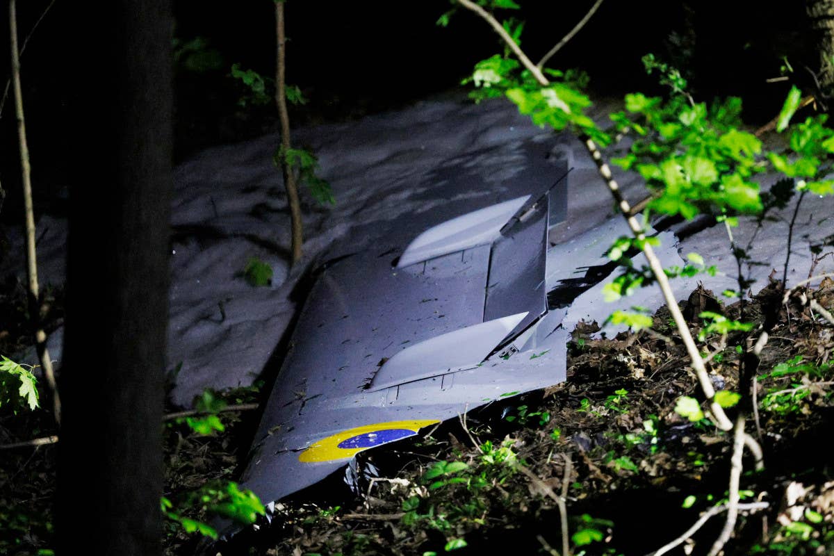 A part of the wing of the shot-down TB2 with its Ukrainian Air Force roundel plainly visible. <em>AP Photo/Alex Babenko</em>