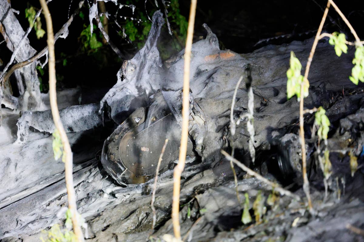 A view of another part of the TB2 wreckage showing what looks to be its sensor turret. <em>AP Photo/Alex Babenko</em>