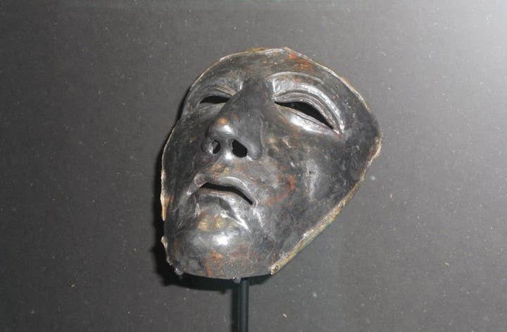 An iron base from a Roman cavalry mask, found at the battlefield. <em>Author's image</em>