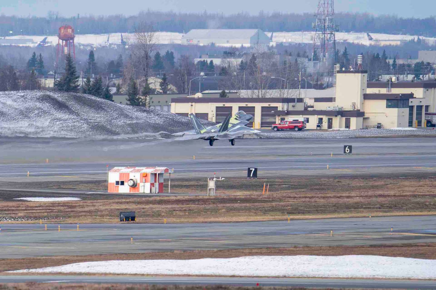 Tail number 07-4146, an F-22 Raptor assigned to the 3rd Wing, successfully takes off during its functional check flight at Joint Base Elmendorf-Richardson, Alaska, May 4, 2023. <em>U.S. Air Force photo by Airman 1st Class J. Michael Peña</em>