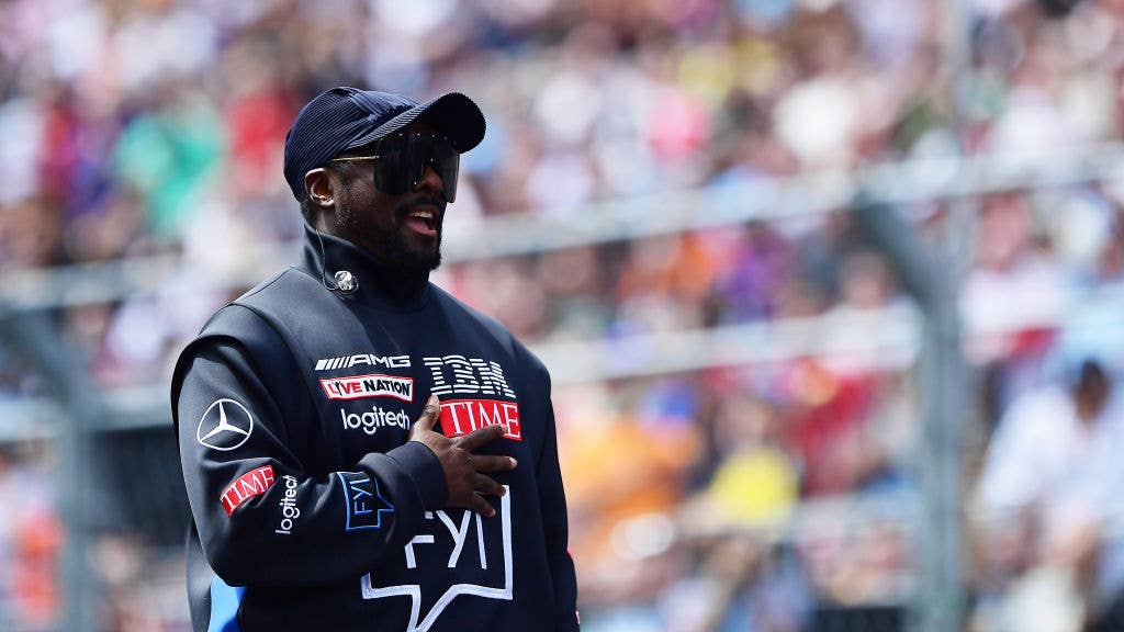 Will.I.Am stands for the national anthem on the grid prior to the F1 Grand Prix of Miami