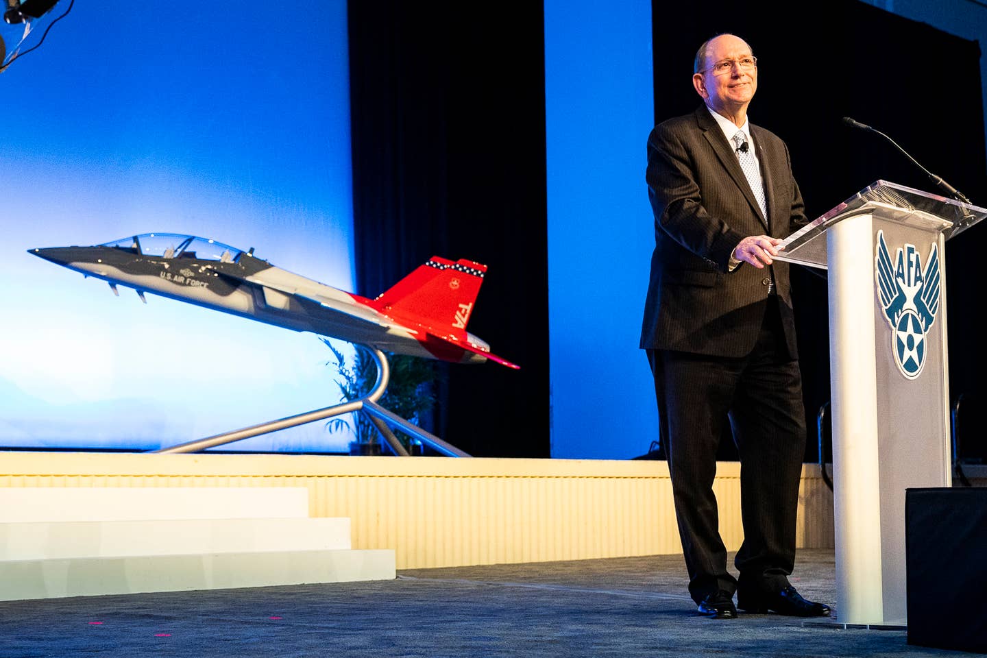 Acting Secretary of the Air Force Matthew P. Donovan reveals the name of the new Air Force trainer aircraft to be the T-7A Red Hawk during the Air Force Association Air, Space and Cyber Conference in National Harbor, Md., Sept. 16, 2019. (U.S. Air Force photo by Tech. Sgt. D. Myles Cullen)