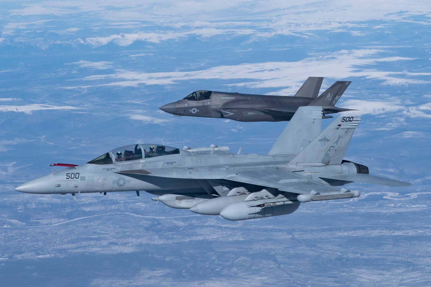 A U.S. Navy EA-18G “Growler” assigned to the Air Test and Evaluation Squadron Nine (VX-9) (front) and a U.S. Marine Corps F-35B Lightning assigned Marine Operational Test and Evaluation Squadron One (VMX-1), receives fuel from a Royal Air Force KC-30 Voyager during Northern Edge 23-1 at Joint Base Elmendorf-Richardson, Alaska, May 9, 2023. Northern Edge 23-1 will provide an opportunity for joint, multinational and multi-domain operations designed to implement high-end, realistic war fighter training, develop and improve joint interoperability, and enhance the combat readiness of participating forces. (U.S. Air Force photo by Airman 1st Class Shelimar Rivera Rosado)