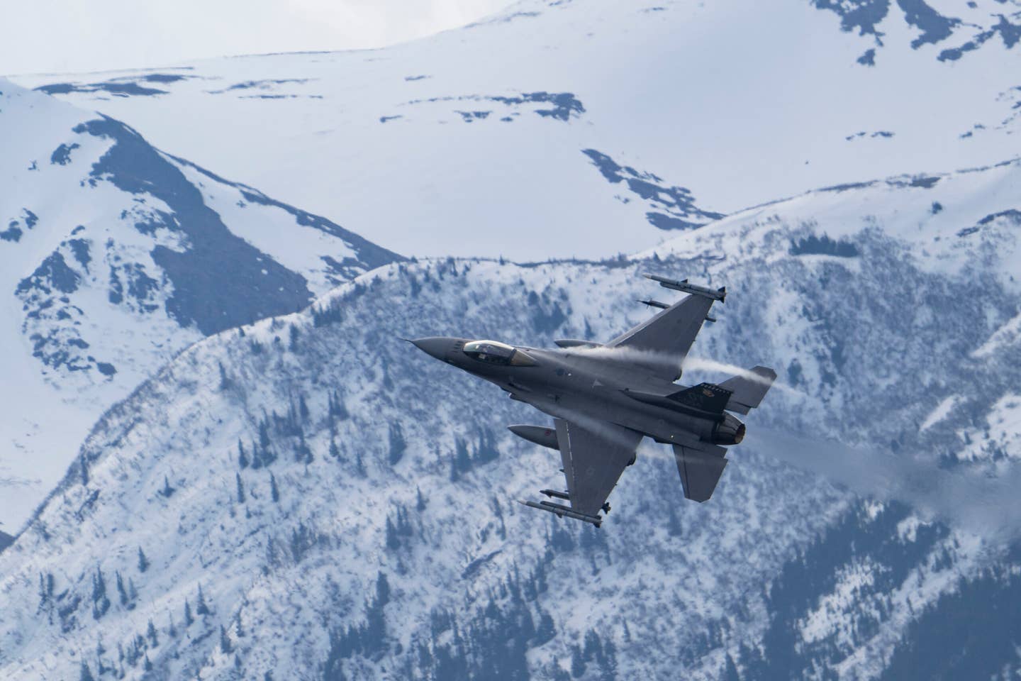 A U.S. Air Force F-16 Fighting Falcon assigned to the 85th Test and Evaluation Squadron, takes off from the flightline during Northern Edge 23-1 at Joint Base Elmendorf-Richardson, Alaska, May 8, 2023. Northern Edge 23-1 provides an opportunity for joint, multinational and multi-domain operations designed to implement high-end, realistic war fighter training, develop and improve joint interoperability, and enhance the combat readiness of participating forces. (U.S. Air Force photo by Airman 1st Class Shelimar Rivera Rosado)