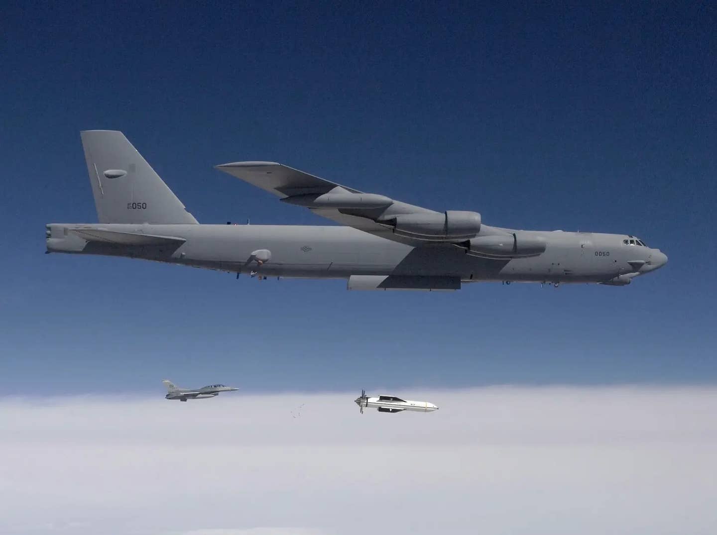 A B-52 releases a test version of the Massive Ordnance Penetrator (MOP) during a test of the weapon over White Sands Missile Range, New Mexico, in 2009.&nbsp;<em>DoD</em>