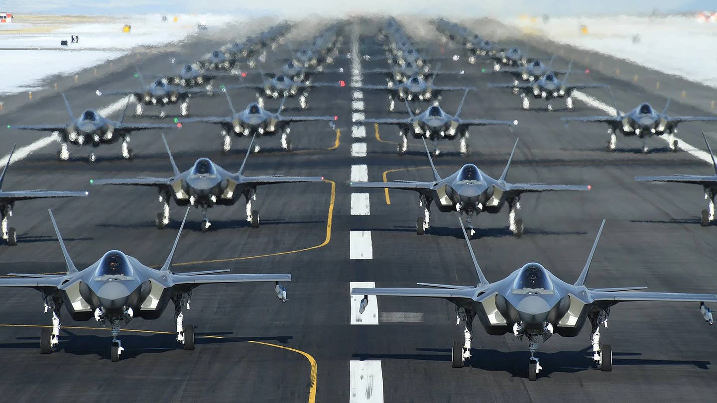 Air Force F-35A Joint Strike Fighters conduct an "Elephant Walk" readiness drill at Hill Air Force Base in 2020. <em>USAF</em>
