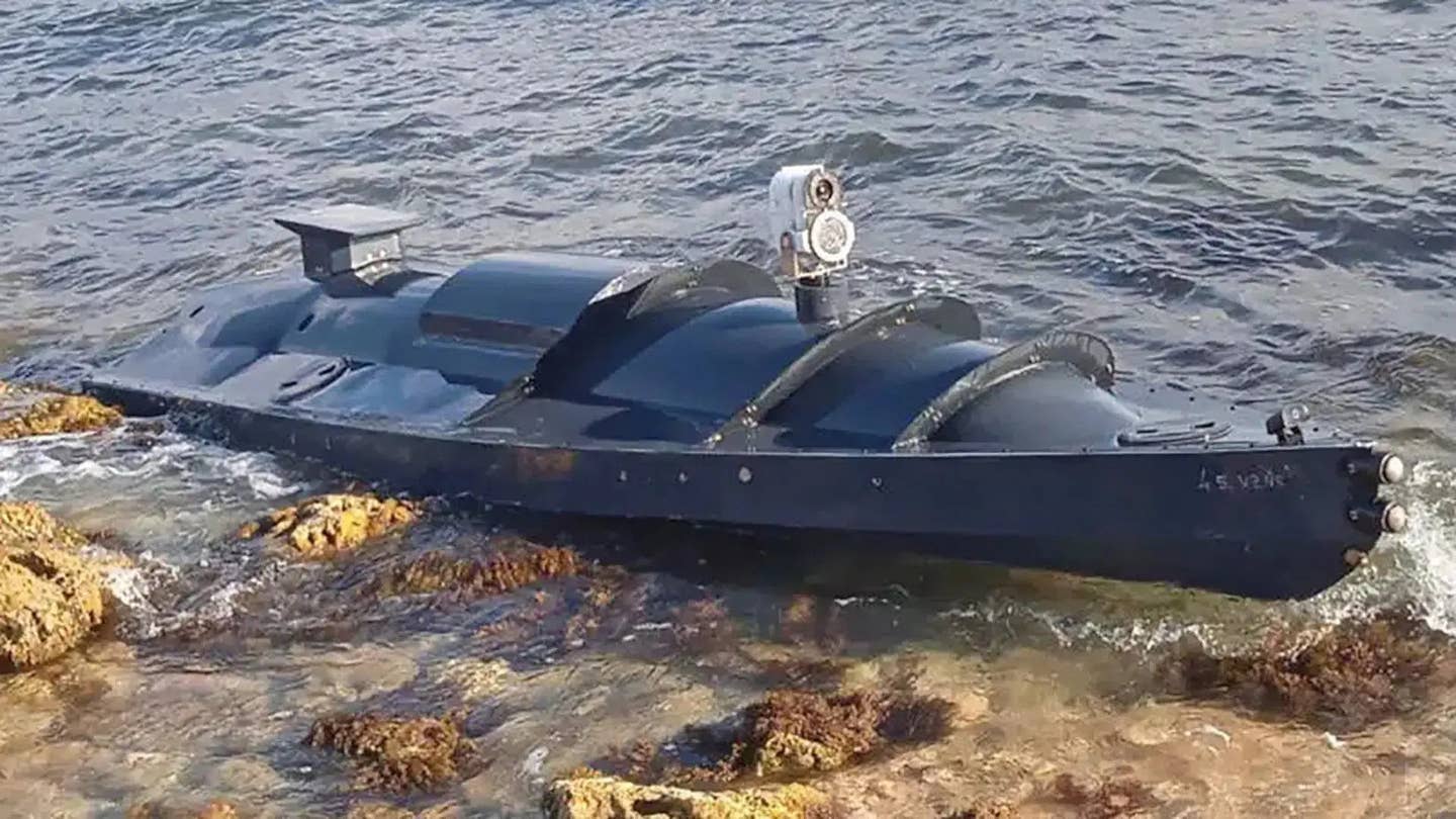 The mysterious unmanned surface vessel that washed ashore in Crimea in early September. At the time,&nbsp;<em>The War Zone's&nbsp;</em>analysis stated the very low profile jet-ski engine-powered unmanned boat was a weaponized 'suicide drone' setup for impact detonation.