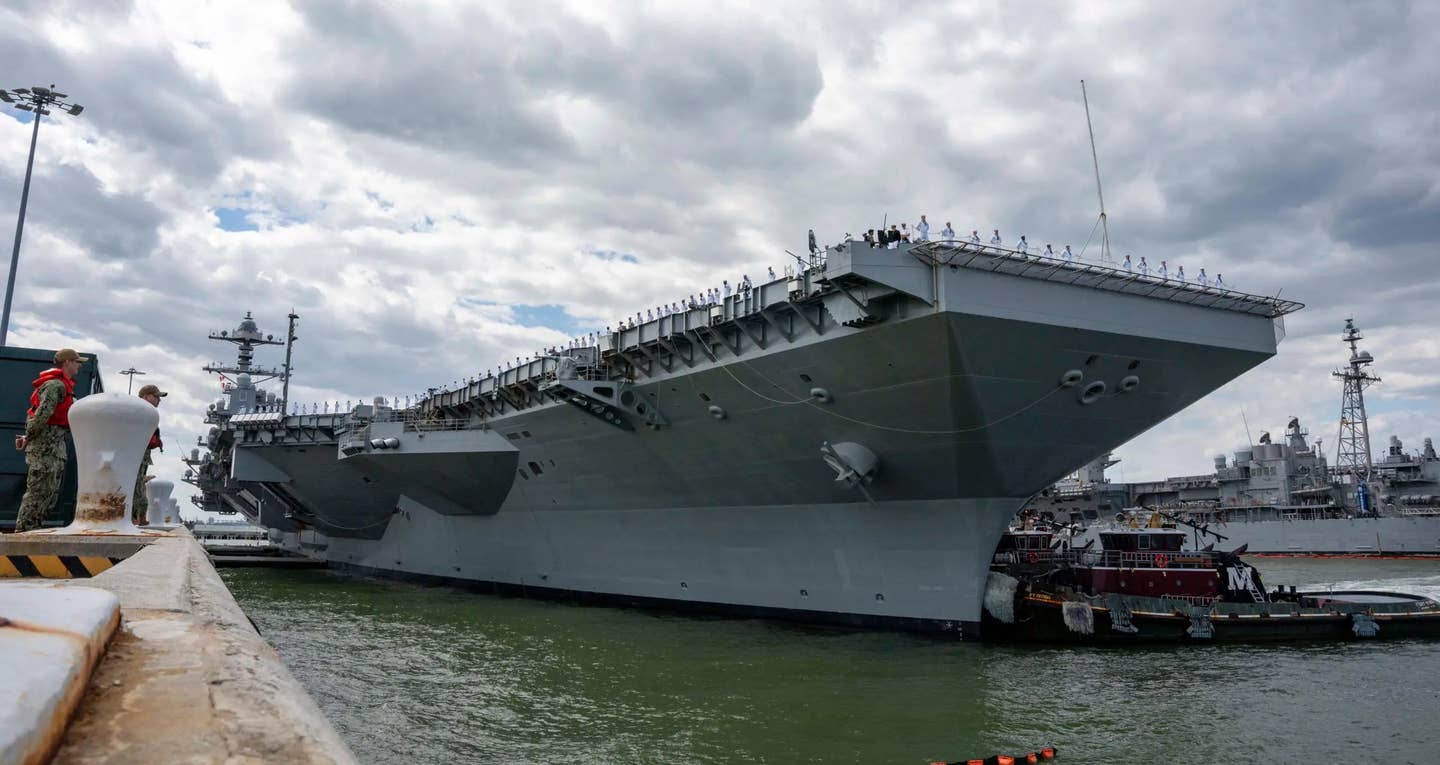 <em>Ford</em>&nbsp;begins to move away from the pier on May 2 as it sets out on its first real operational deployment.&nbsp;<em>USN</em>