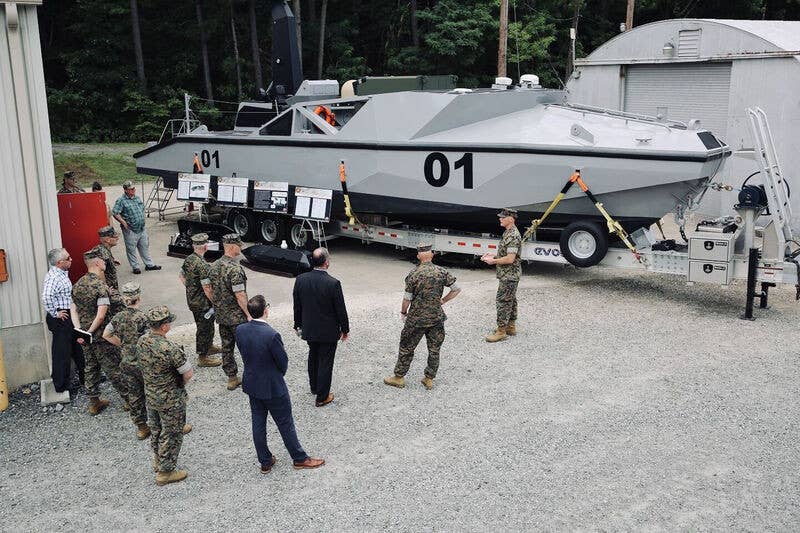 A picture of an LRUSV prototype in 2022. The drone boat has the Hero-120 launcher installed here, but it is in its stowed position and not as visible. <em>USN</em>