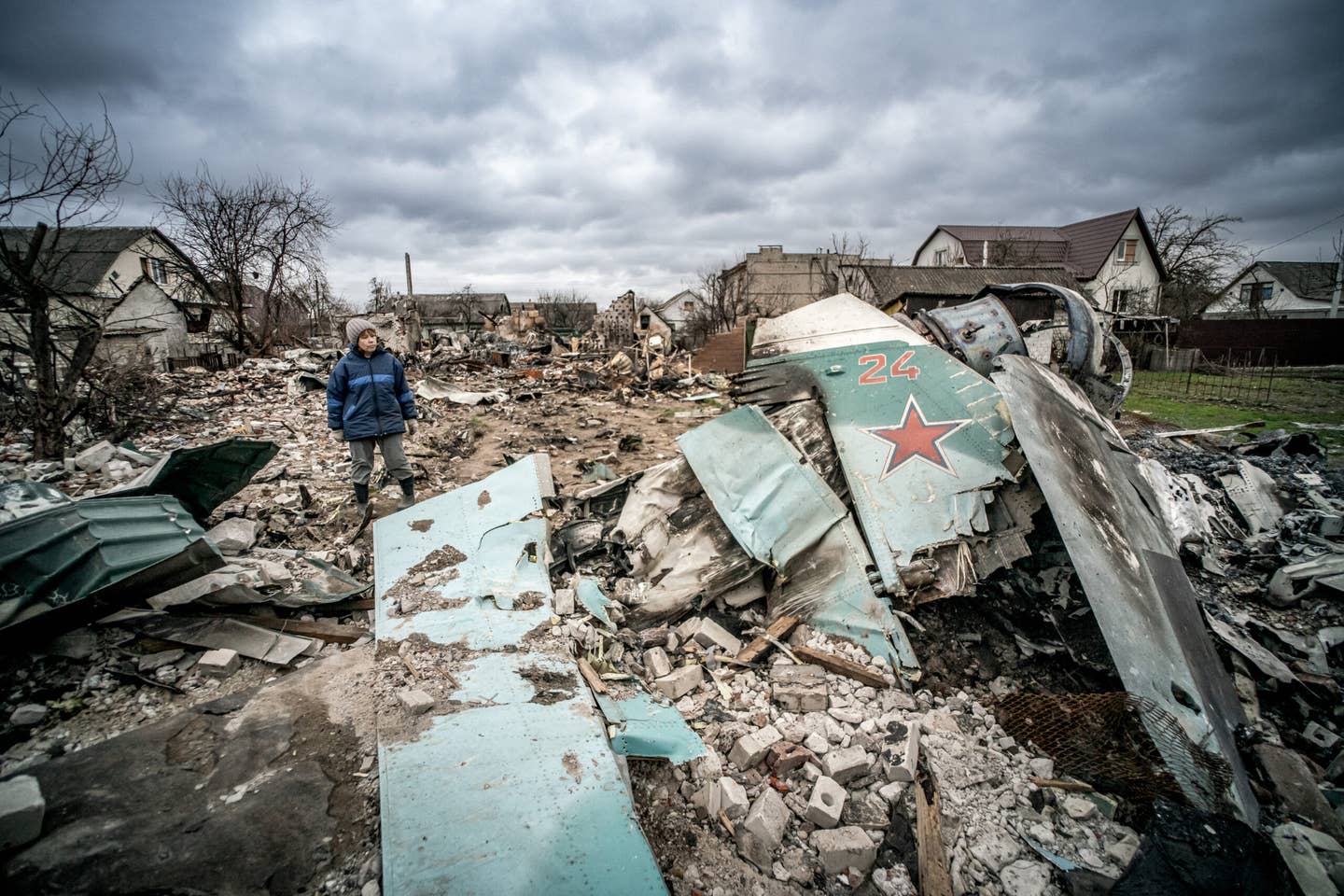 A Su-34 shot down by Ukrainian anti-aircraft guns over a residential area of Chernihiv in April 2022. <em>Photo by Nicola Marfisi/AGF/Universal Images Group via Getty Images</em>