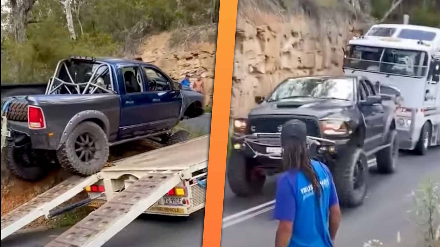 Built Ram Off-Roader Recovers Stuck Semi-Truck By Crawling Over Trailer
