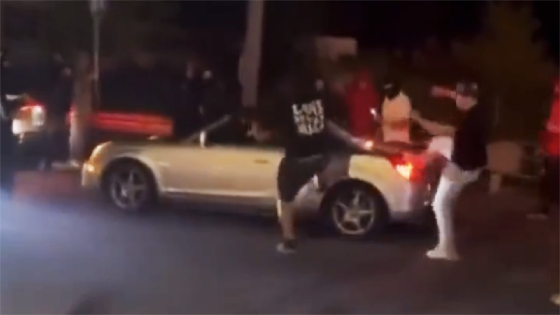 Mob Destroys Toyota MR2 Spyder After Owner Accidentally Drives Through Street Takeover
