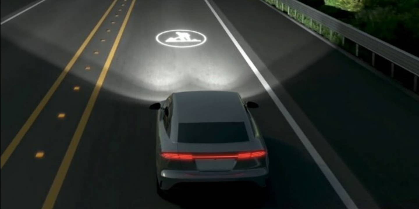 New Headlight Tech Projects Traffic Signs on the Road Ahead Like a HUD