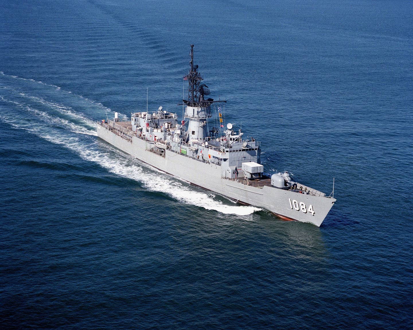 A starboard bow view of the <em>Knox</em> class frigate USS <em>McCandless</em> (FF-1084) underway in Thimble Shoals en route to the open ocean for sea trials. (USN)