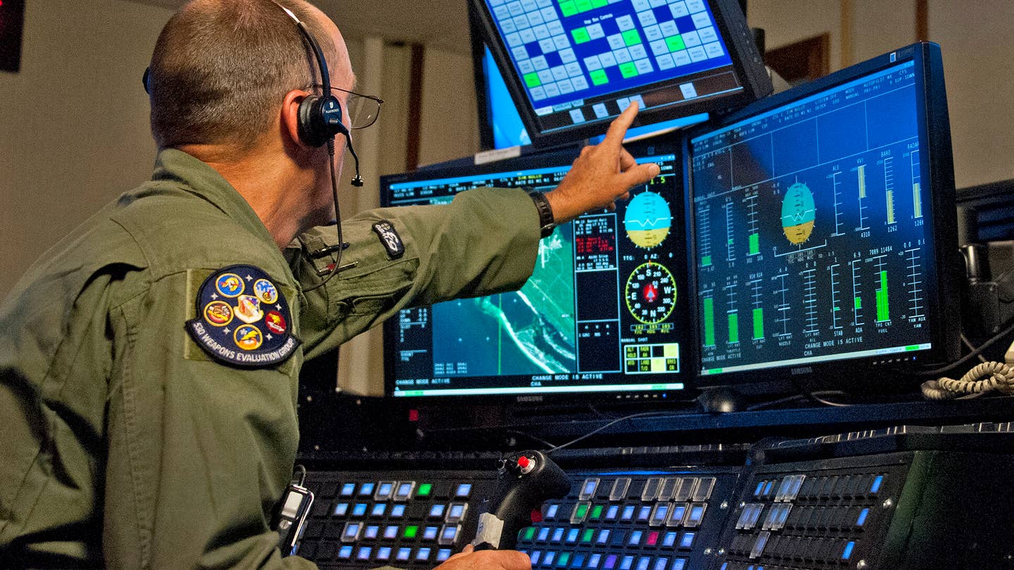 Tom Mudge seen remotely piloting a QF-4 during a Combat Archer mission before the type was retired. <em>USAF/Sara Vidoni</em>