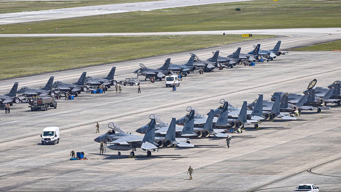 The packed Combat Archer flight line in May 2023 with a mix of F-16s, F-15s, and F-35s. <em>Jamie Hunter</em>