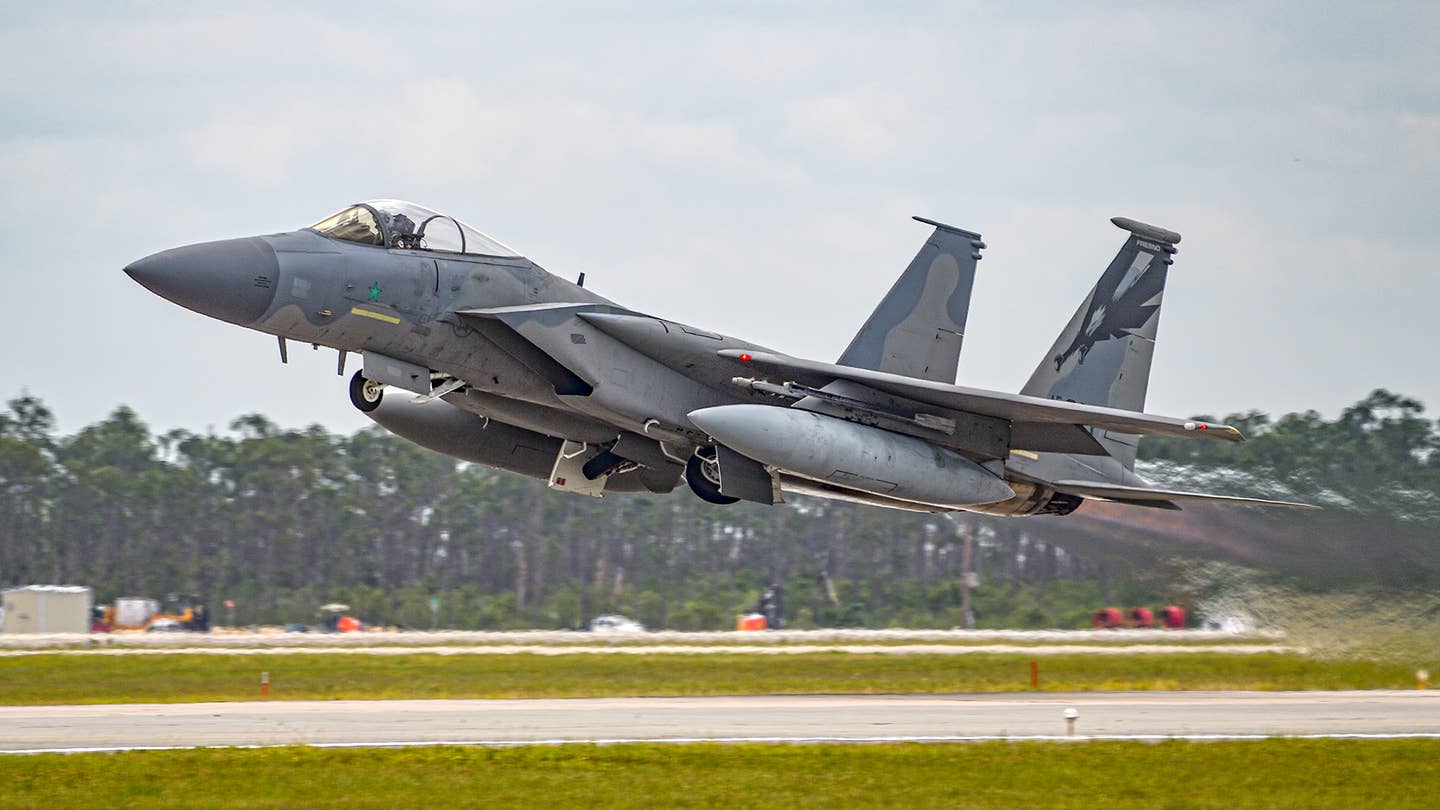 An F-15C of the California Air National Guard gets airborne during Combat Archer. <em>Jamie Hunter</em>