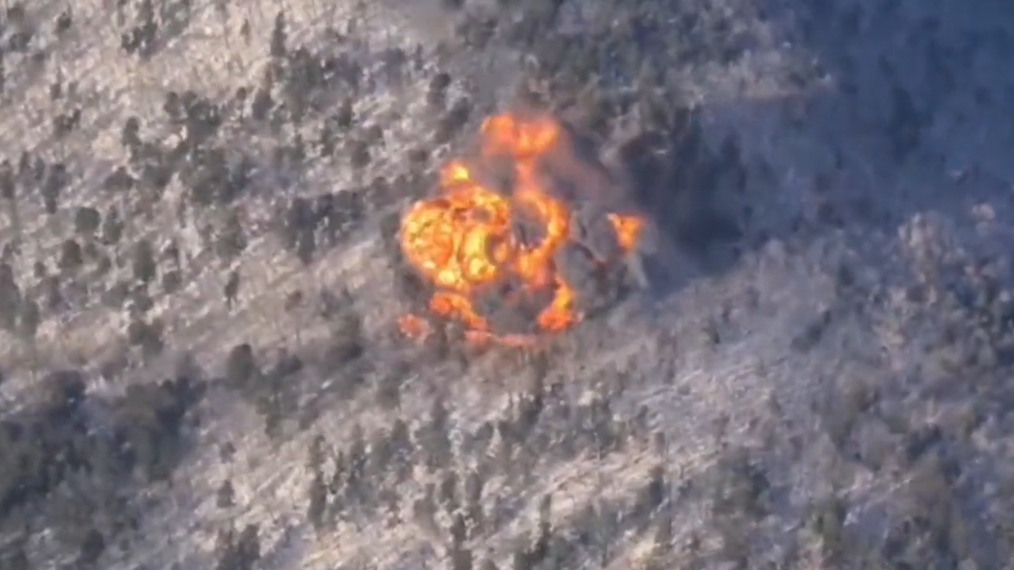 A fireball rises from rugged terrain after the MiG-31 crashed. <em>Via @Fighterbomber on Telegram.</em>
