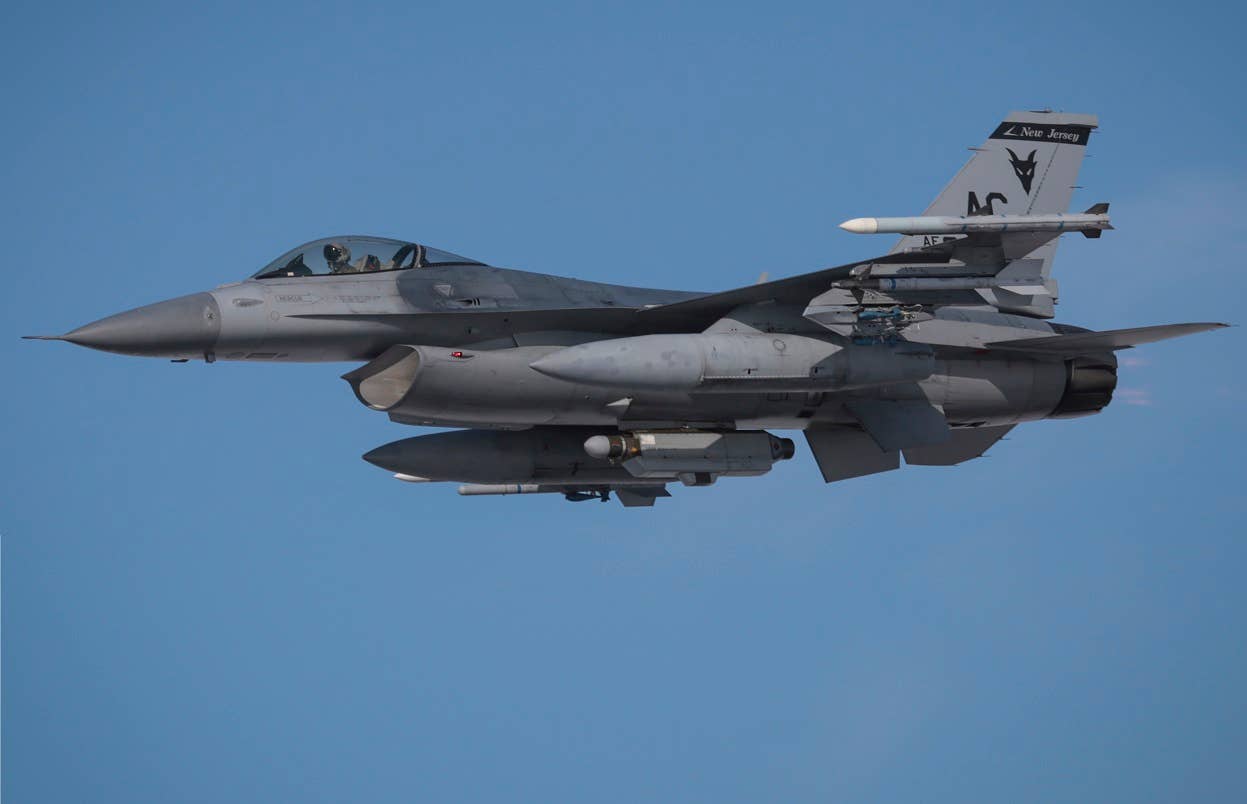 An F-16C sporting an AN/ALQ-131 self-protection pod on its centerline station. (U.S. Air National Guard photo by Tech. Sgt. Matt Hecht/Released)